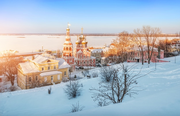 Christmas Church in Nizhny Novgorod in the rays of sunset on the high bank of the Volga o