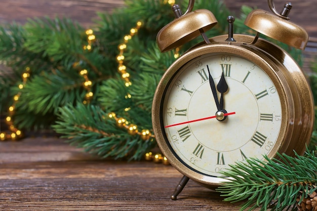 Christmas clock and fir branches