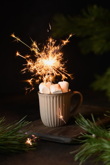 Christmas coffee or cocoa with marshmallow and sparklers.