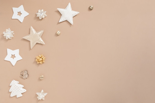 Christmas composition. Gifts, craft and golden decorations on white background. Flat lay, top view, copy space