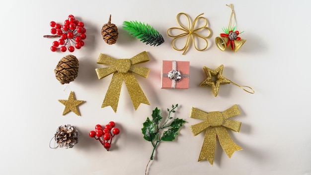 Christmas composition toys gifts pine branches on a white background Flat lay