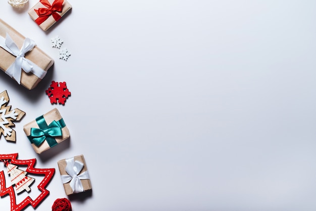 Christmas composition on white background. holiday decorations and gift boxes. Top view, flat lay.