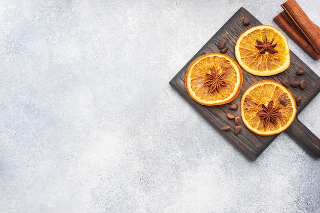 Christmas composition with dried oranges, cinnamon, anise, and nuts