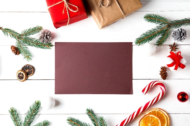 Christmas composition on wooden white background