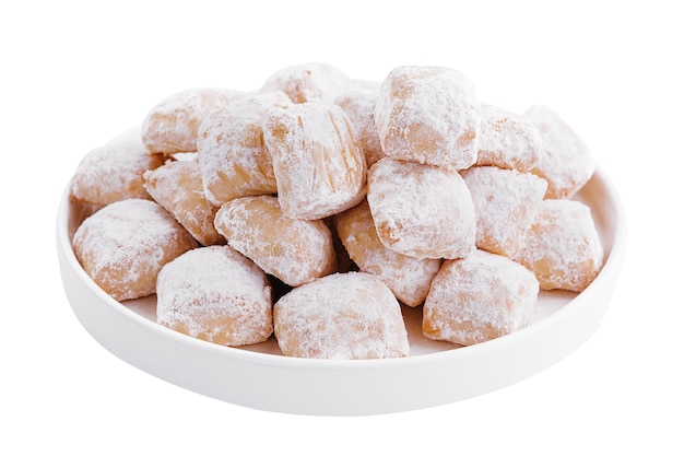 Christmas cookies with powdered sugar on plate