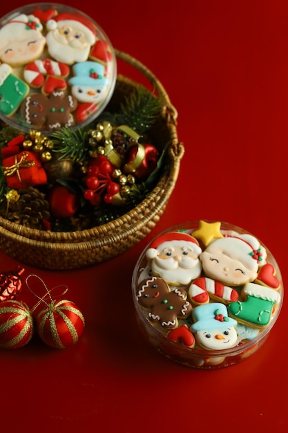 Christmas cookies with royal icing decorations with Red background