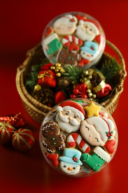 Christmas cookies with royal icing decorations with Red background