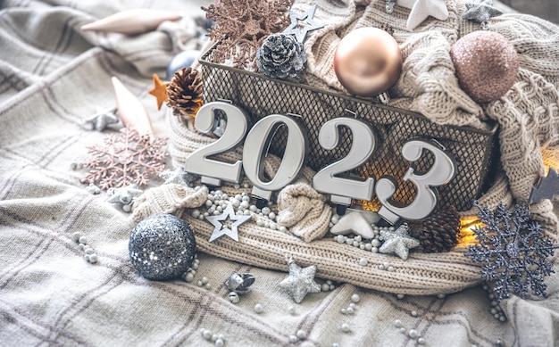 Christmas cozy background with numbers 2023 and decor details