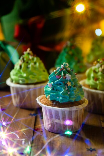 Christmas cupcakes in the form of a Christmas tree Christmas dessert closeup with selective focus