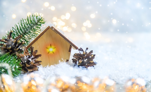 Christmas decor, new year snow house. Selective focus. Holiday.