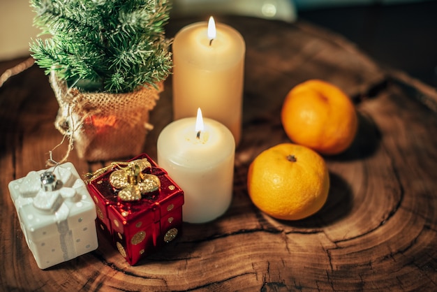 Christmas decor with candles and gifts