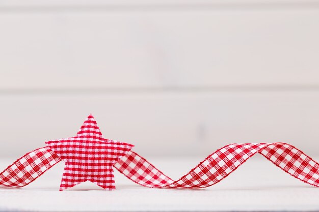 Christmas decor on the wooden white background