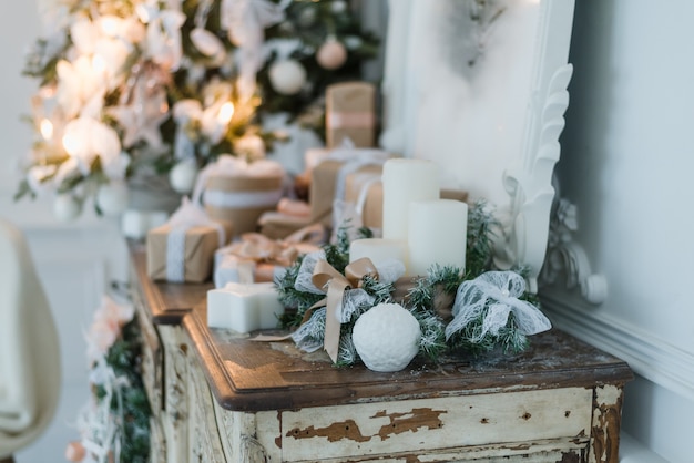 Christmas decoration on ancient vintage old commode chest of drawers