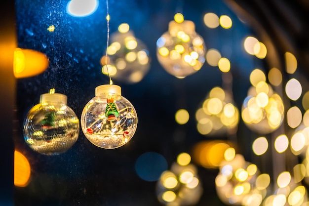 Christmas decoration lights in the shape of a star for with rope on Bokeh background Decoration During Christmas and New Year.