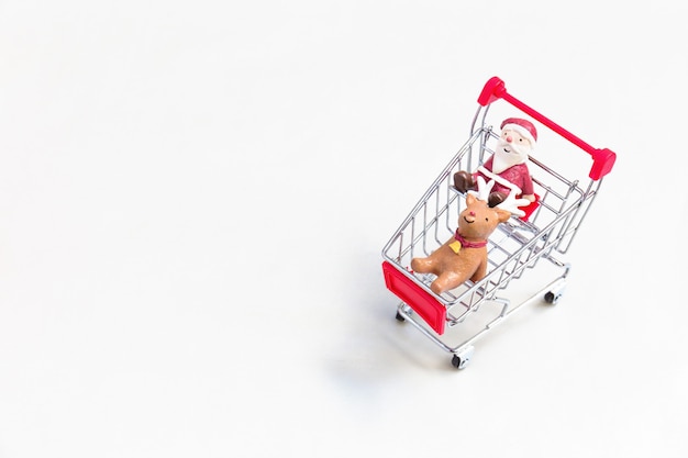 Christmas decoration on red shopping cart.