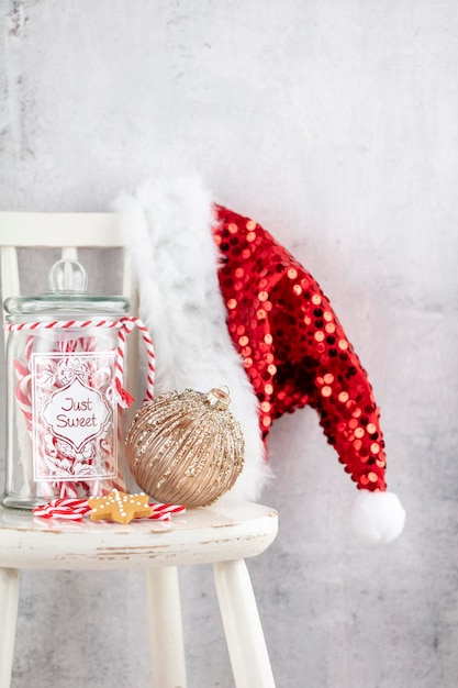 Christmas Decoration Santa Claus Hat And Wooden Chair