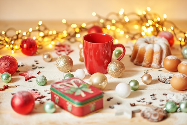 Christmas decoration on the table with a cupcake and cookies