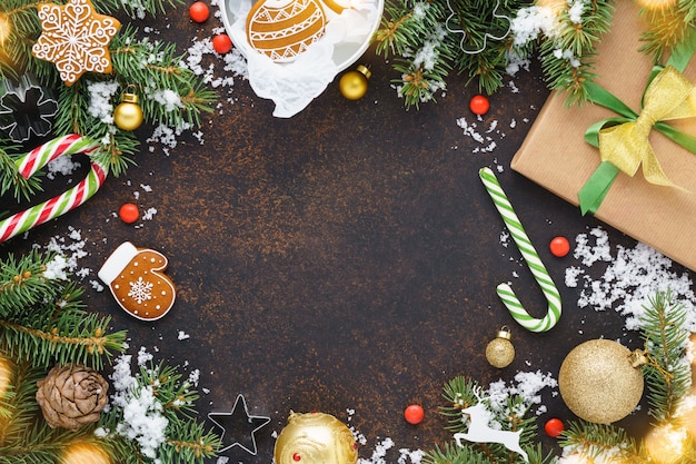 Christmas decoration with gift box, cookies and candy canes