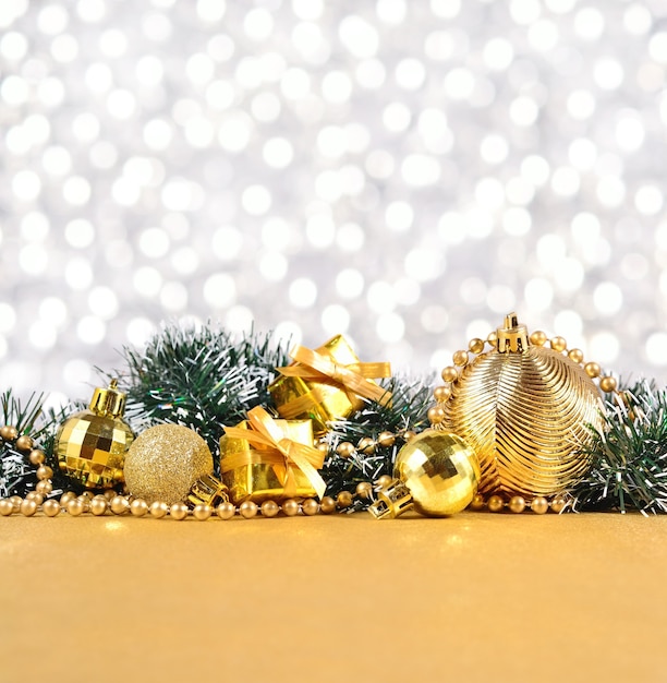 Christmas decorations on a bokeh silvery background