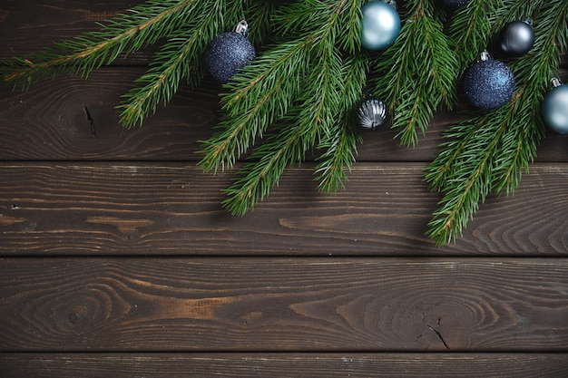 Christmas decorations and Christmas gifts on an old wooden table. Christmas background. 