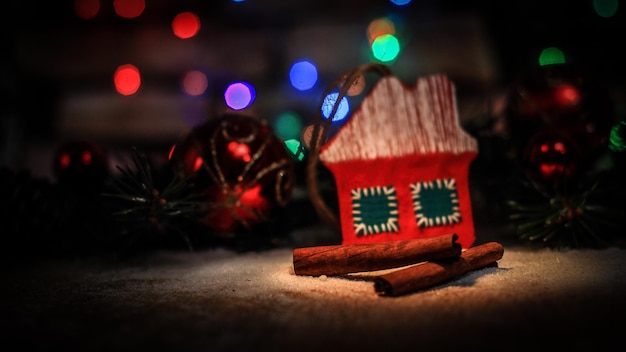 Christmas decorations and cinnamon sticks on a festive backgrou