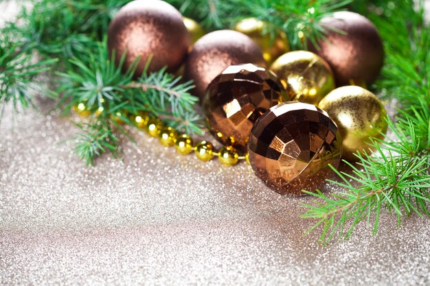 Christmas decorations and evergreen fir tree branch.