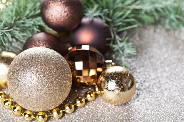 Christmas decorations and evergreen fir tree branch.