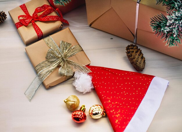 Christmas decorations festive packaging boxes with gifts lie on the table on a white background