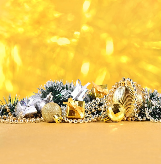 Christmas decorations on a golden bokeh background