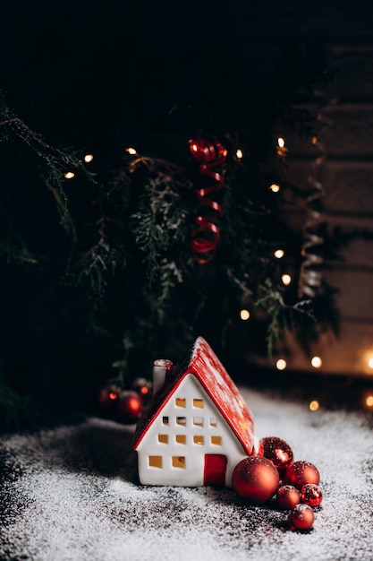 Christmas decorations a house with a pine