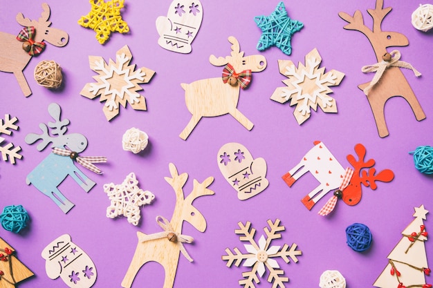 Christmas decorations on purple table