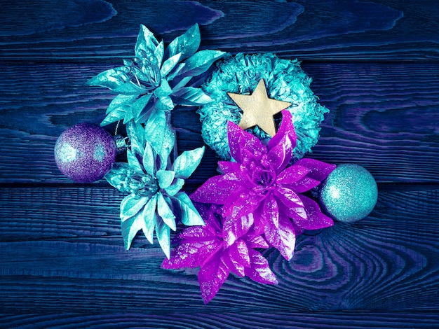 Christmas decorations Top view New Year decorations on a dark wooden background Blue toning