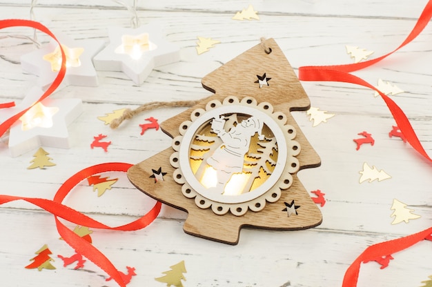 Christmas decorations on white wooden background