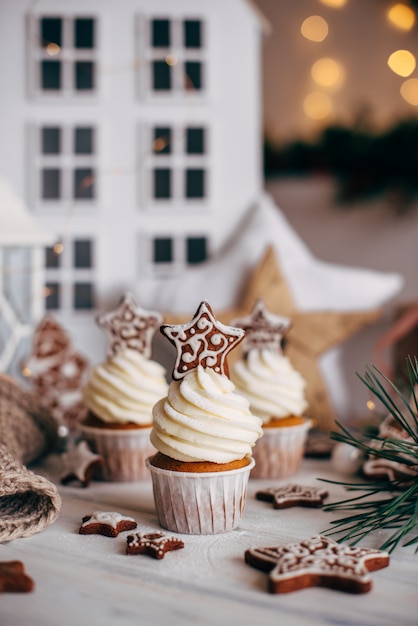 Christmas delicious cupcakes decorated with a gingerbread star. 