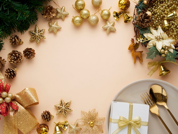 Christmas dinner table setting with gold decorations