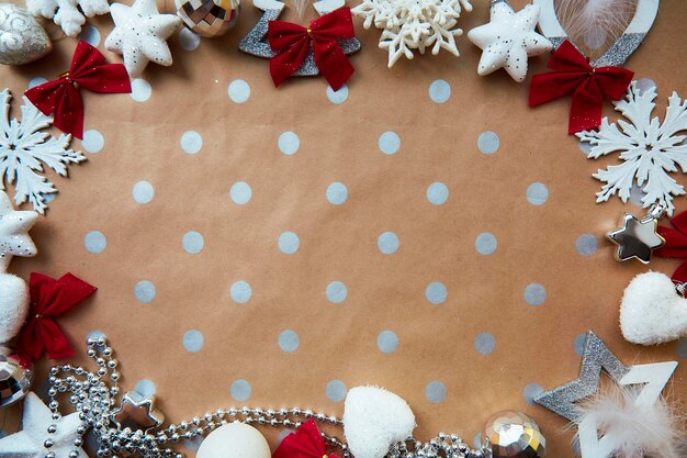 Christmas festive frame from ornaments background basic classic patternplace for text Trendy decorations disco balls snowflakes fluffy Christmas tree toys Aesthetic atmosphere and festive card