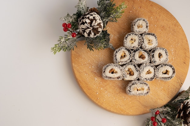 Christmas festive sweets with seasons decorations on white background