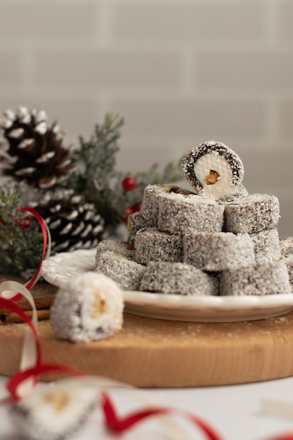 Christmas festive sweets with seasons decorations on white background