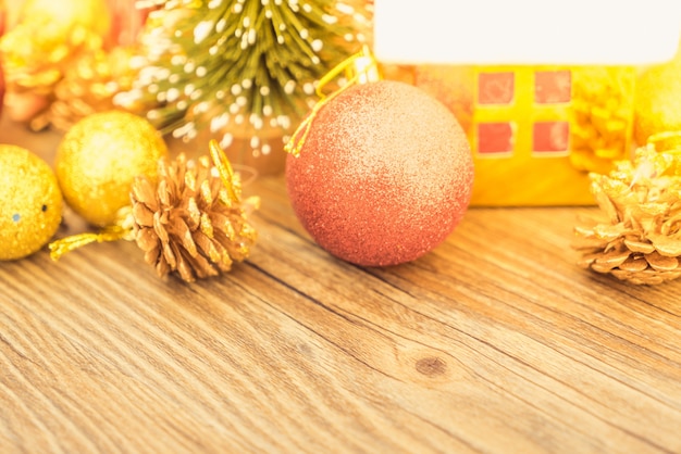 Christmas fir tree on wooden board background with copy space