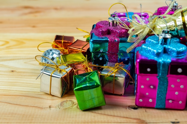 Christmas gift box on wood