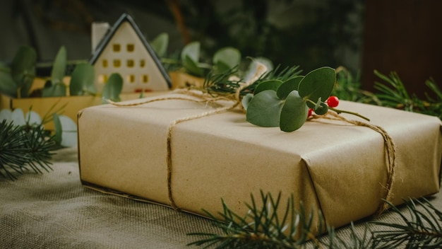 Christmas gift box wrapped in brown paper Eco friendly Christmas present packaging