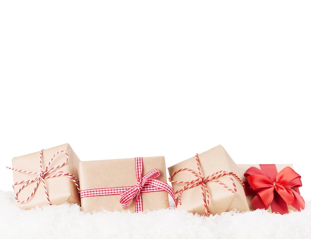 Christmas gift boxes in snow