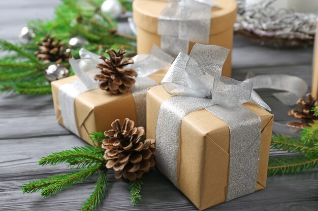 Christmas gift boxes on wooden table