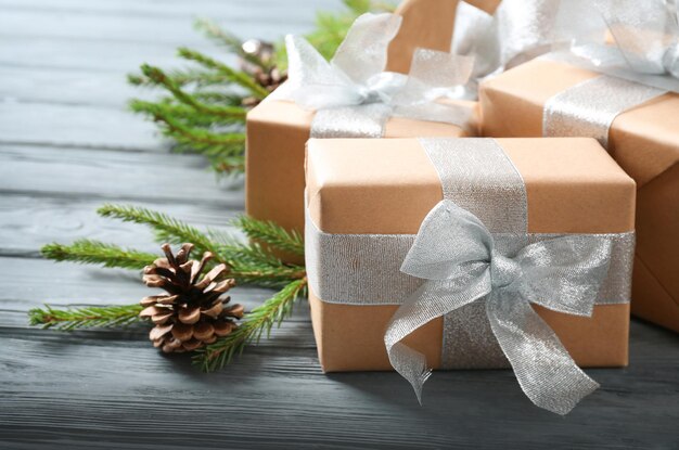 Christmas gift boxes on wooden table