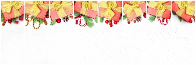 Christmas gifts Composition collage with red gift stars garland green Xmas fir branch red holly berries and baubles on white background