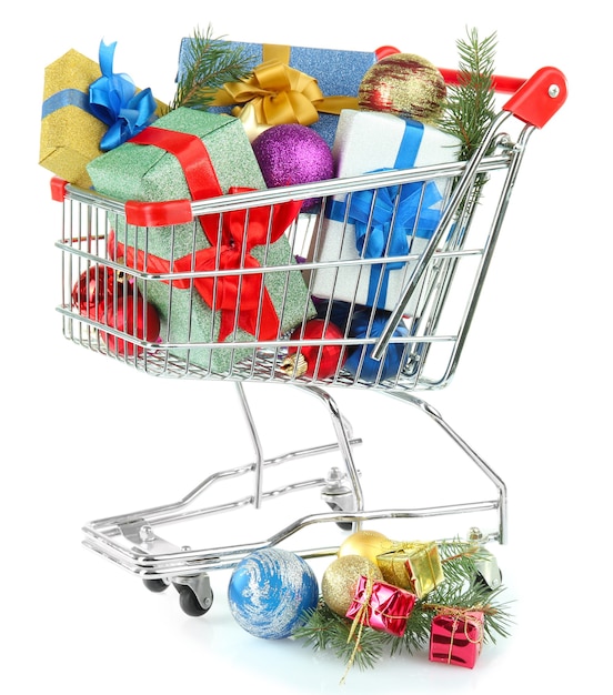 Christmas gifts in shopping trolley, isolated on white