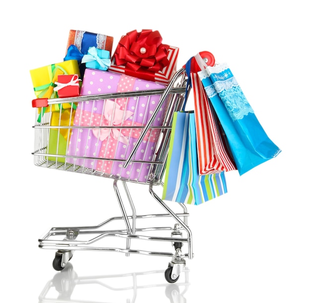 Christmas gifts and shopping in trolley isolated on white