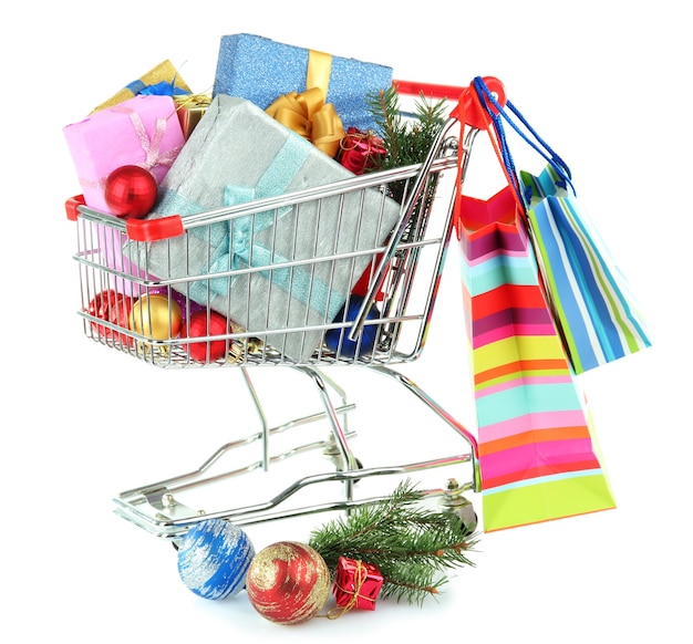 Christmas gifts in shopping trolley, isolated on white