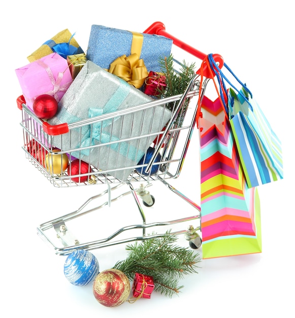 Christmas gifts in shopping trolley, isolated on white