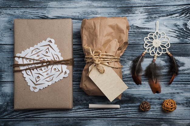 Photo christmas gifts on wooden table, top view